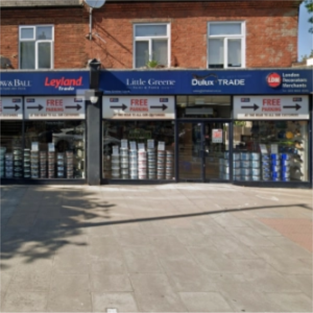 Storefront of LDM Richmond with various brand logos on a brick building
